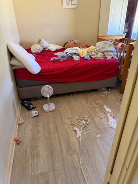 Bedroom before household cleaning